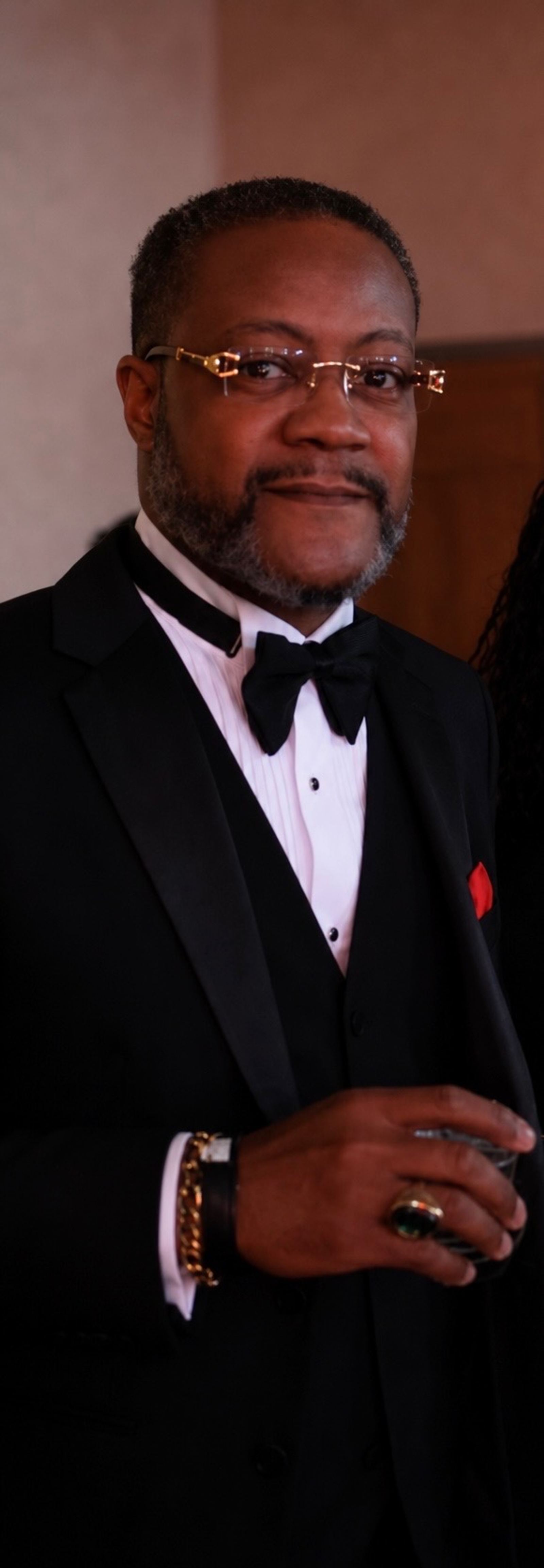 Dr. U. A. Thompson at a formal event